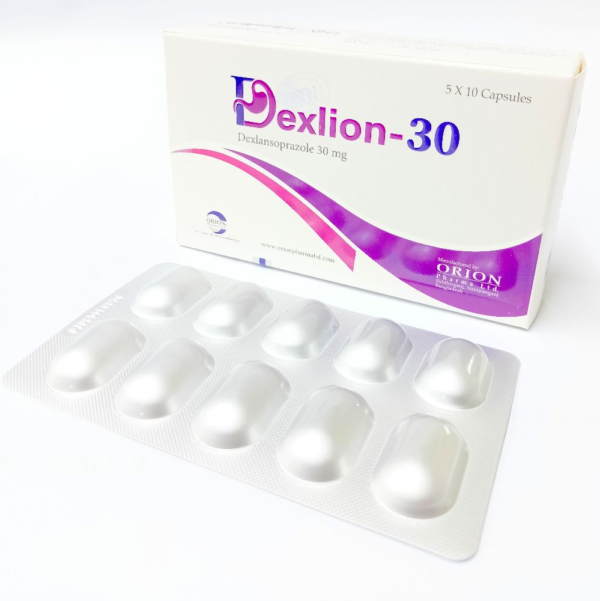 A bottle of Dexlion 30 capsules next to a glass of water on a table.